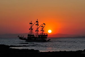 Disco ship in sunset at Side, Turkey
