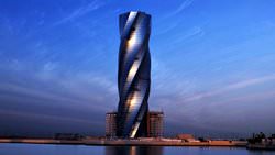 Twisted Spiral Buildings and Towers That Are Real