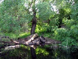 Fisherman boats on the river bank