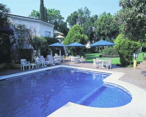 Отель Hotel Hacienda Los Laureles